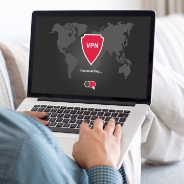 man on laptop vpn services typing